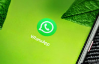 A WhatsApp app icon closeup on a smartphone for the best chat apps for android list