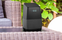 An image of a smart speaker on an outdoor patio set, as part of a smart speaker deal during August of 2018.