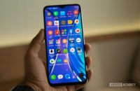 Realme XT in hand with apps