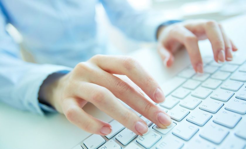 Woman Typing Coding Keyboard The Ultimate Python Programmer and Data Certification Bundle