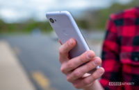 Google Pixel 3a Purple-ish Holding Phone
