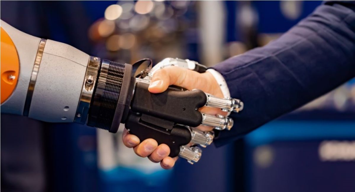 Businessman and robot shaking hands Essential AI for robot survival
