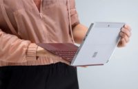 Microsoft Surface Go held on hands