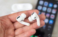Apple AirPods Pro earbuds iPhone hand