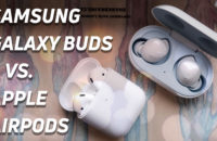 Samsung Galaxy Buds versus Apple's new AirPods (2019) top-down hero image.