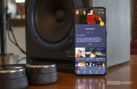 An image of a smartphone with the Plex music player on screen.