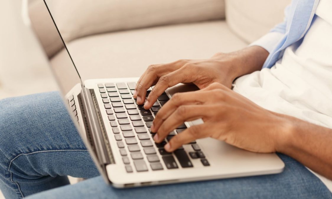 Man Sofa Laptop Typing Coding Man Sofa Laptop Typing Coding