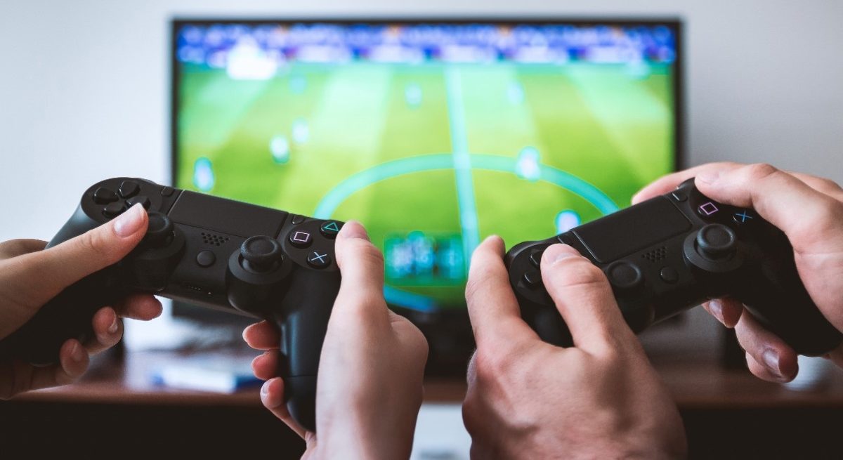 two people playing ps4 two people playing ps4